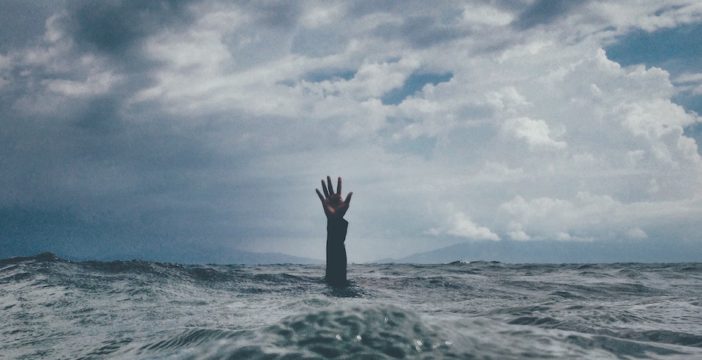 hand in ocean