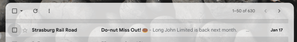 An email subject line says "Do-nut miss out" and uses an emoji to incite your curiosity of what the long john limited train ride event entails.