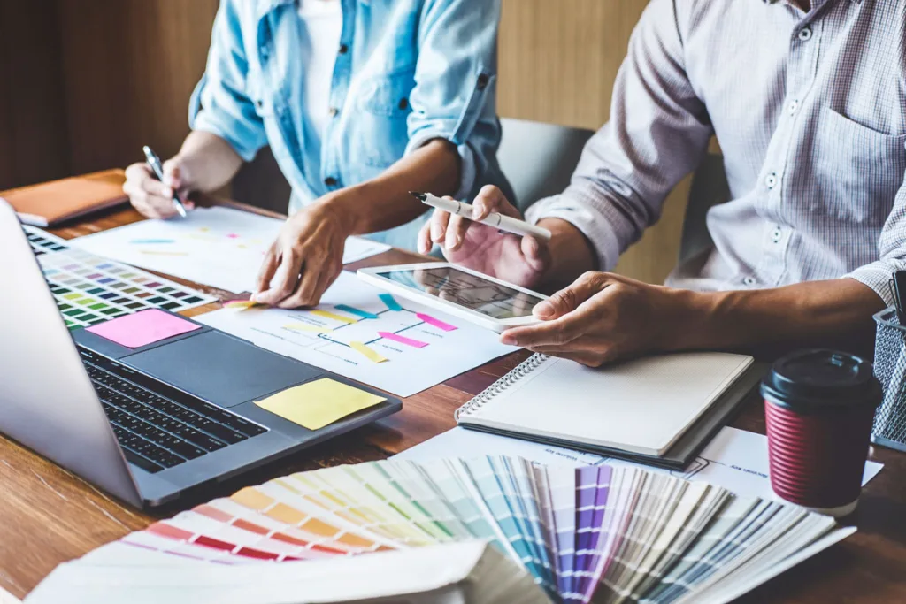 DesignersComparingColorPalettes Unlocking the Importance of Website Color Palette Accessibility