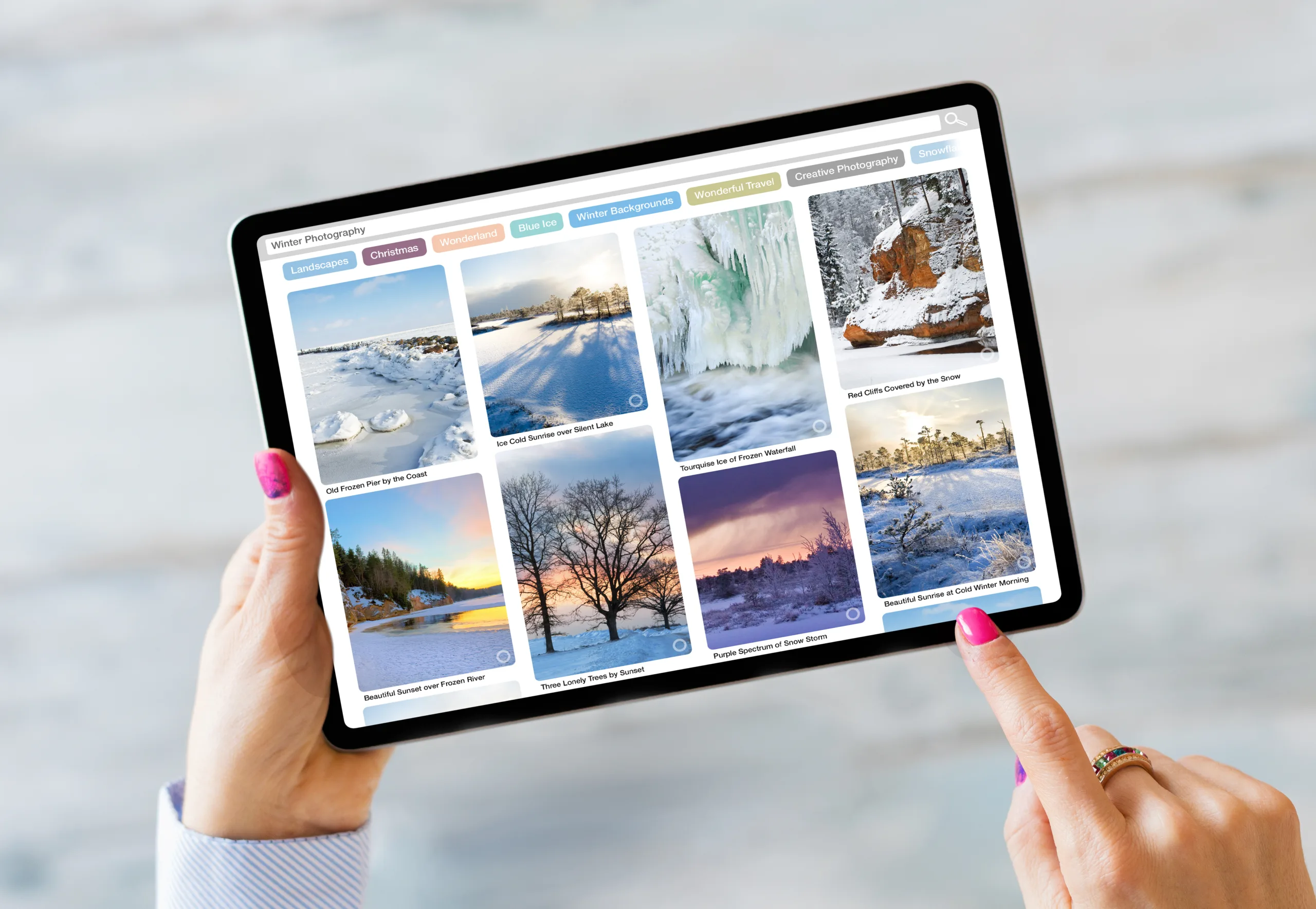 A woman browses Pinterest pins on her iPad.