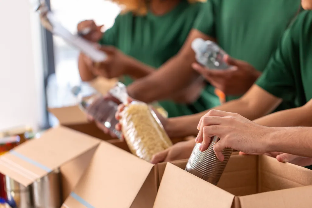 mission driven organizations volunteers packing donations Nonprofit Digital Marketing Agency